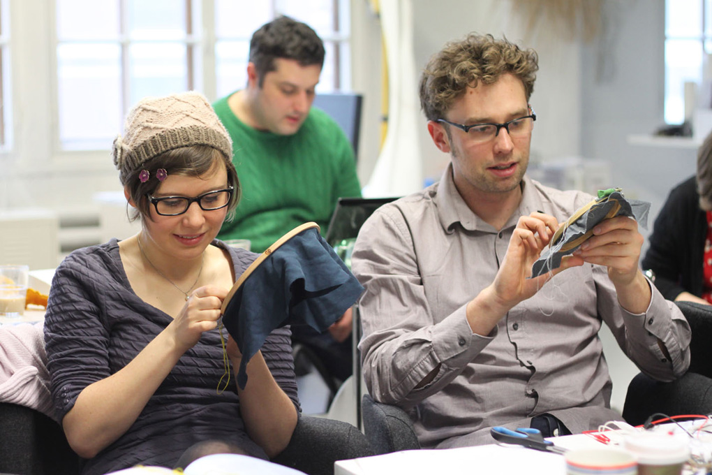Participants embroidering